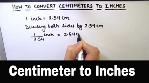 Convert cm to inches .
